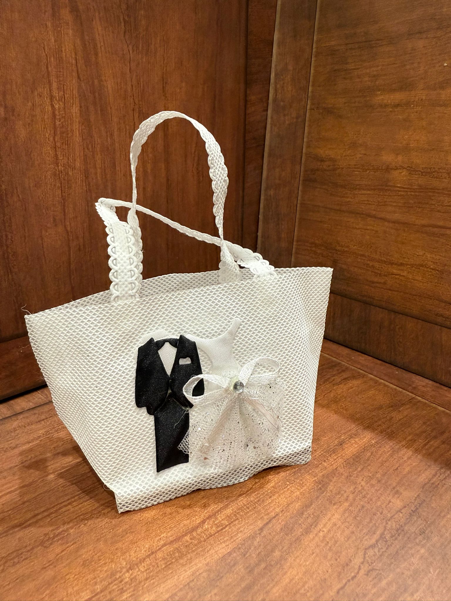 توزيعات للعرسان (كل 12 توزيعة )