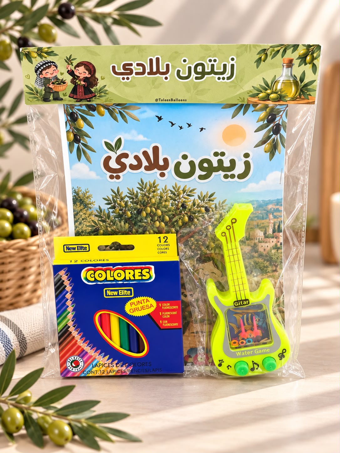 دفتر زيتون مع الوان مع لعبة جيتار مغلف وجاهز مع امكانية كتابة الاسم