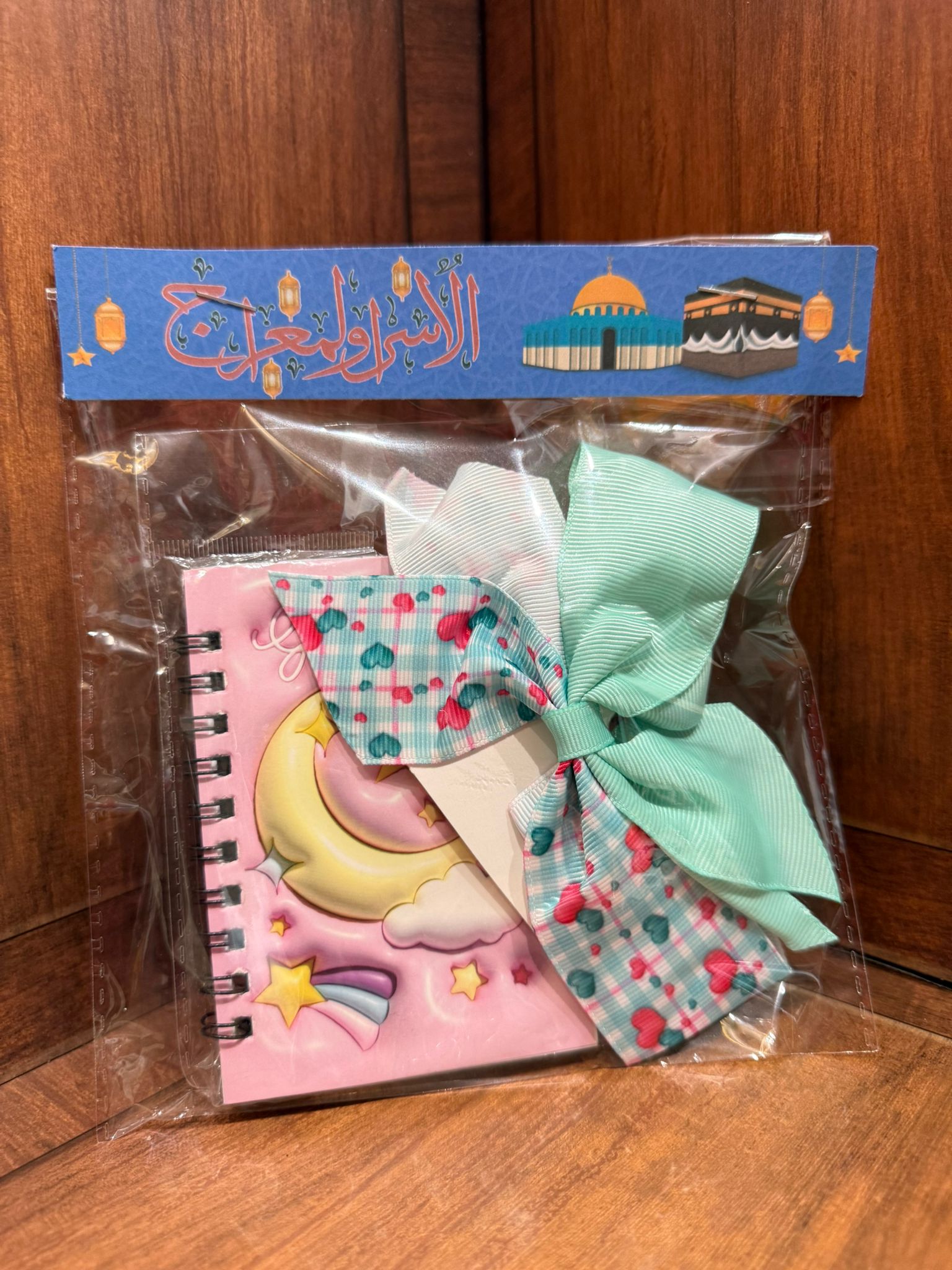 دفتر نوت مع ربطات شعر مغلفة للاسراء والمعراج