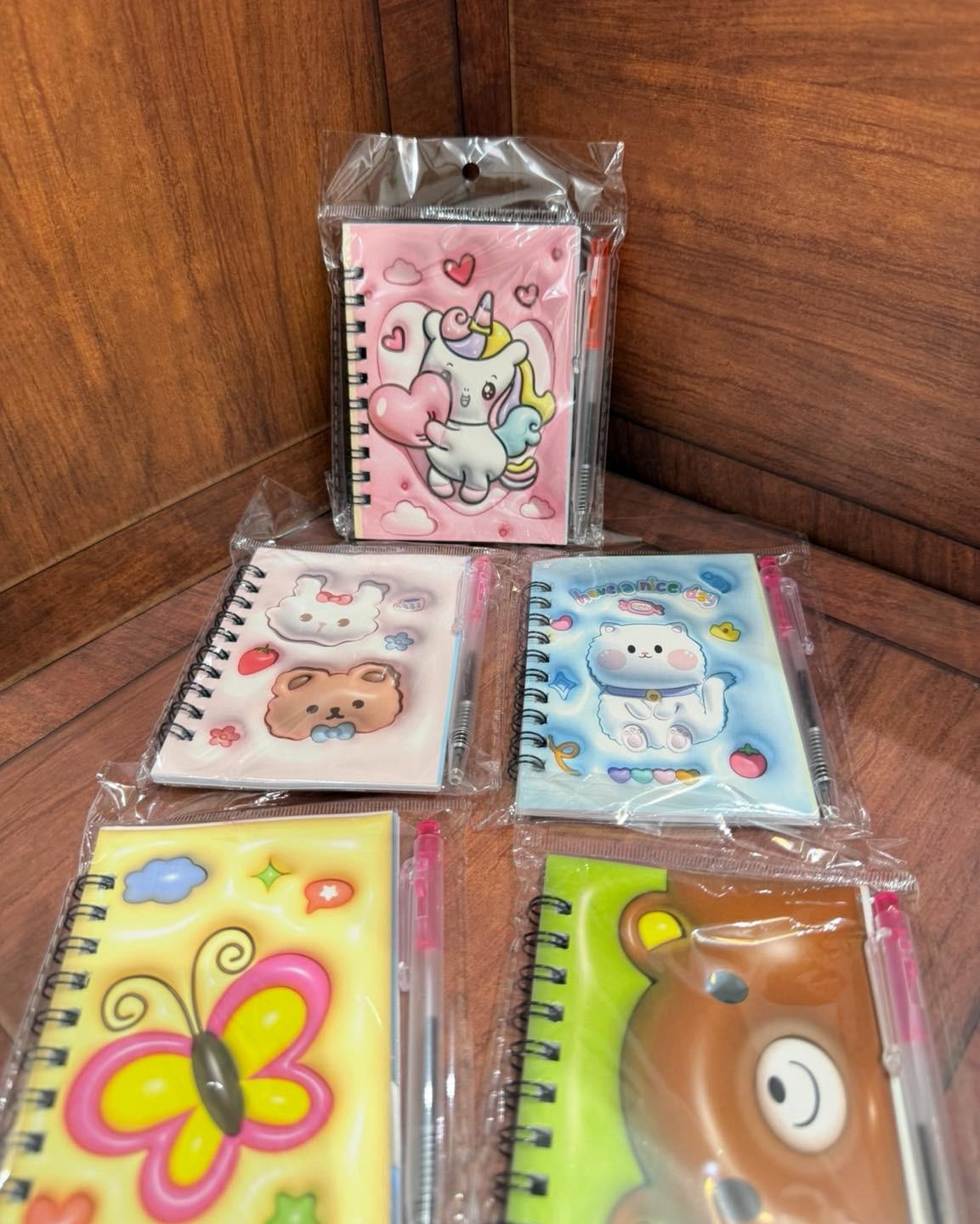 دفاتر نوت مع قلم