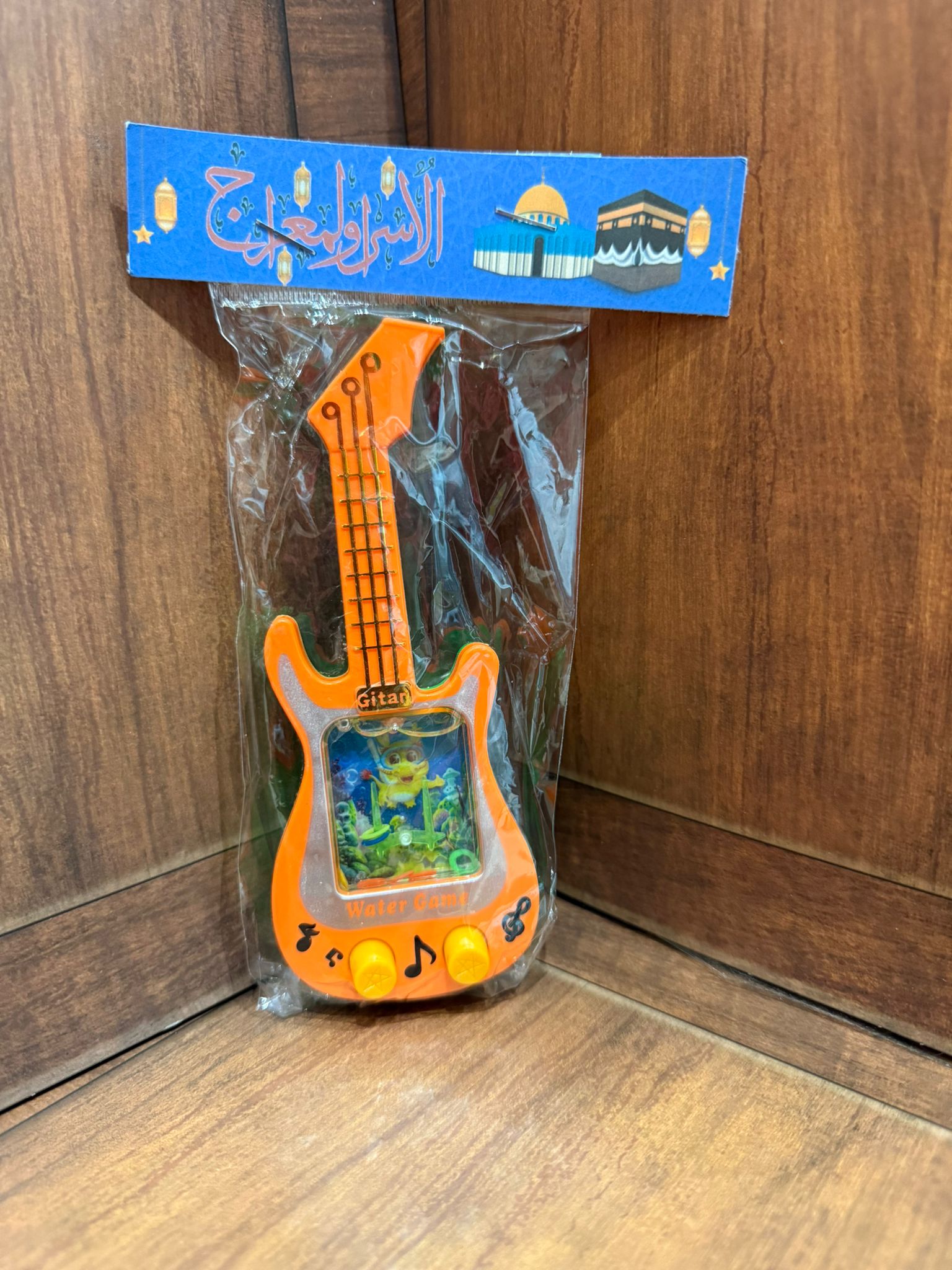 لعبة الجيتار مع تغليف للاسراء والمعراج