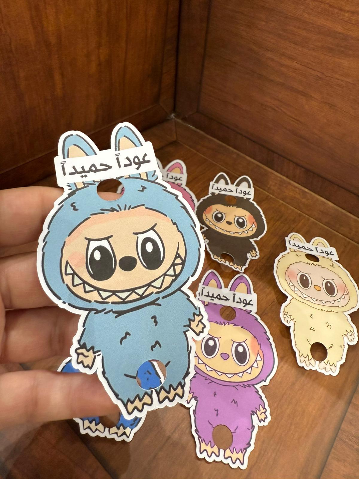 بطاقات لابوبو مع فتحة للقلم